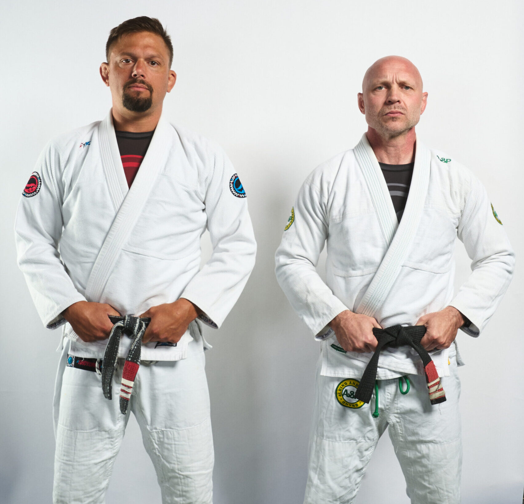 Cameron Mitchell and Scott Cook, head coaches of Deep Water BJJ, wearing Brazilian Jiu-Jitsu gis.