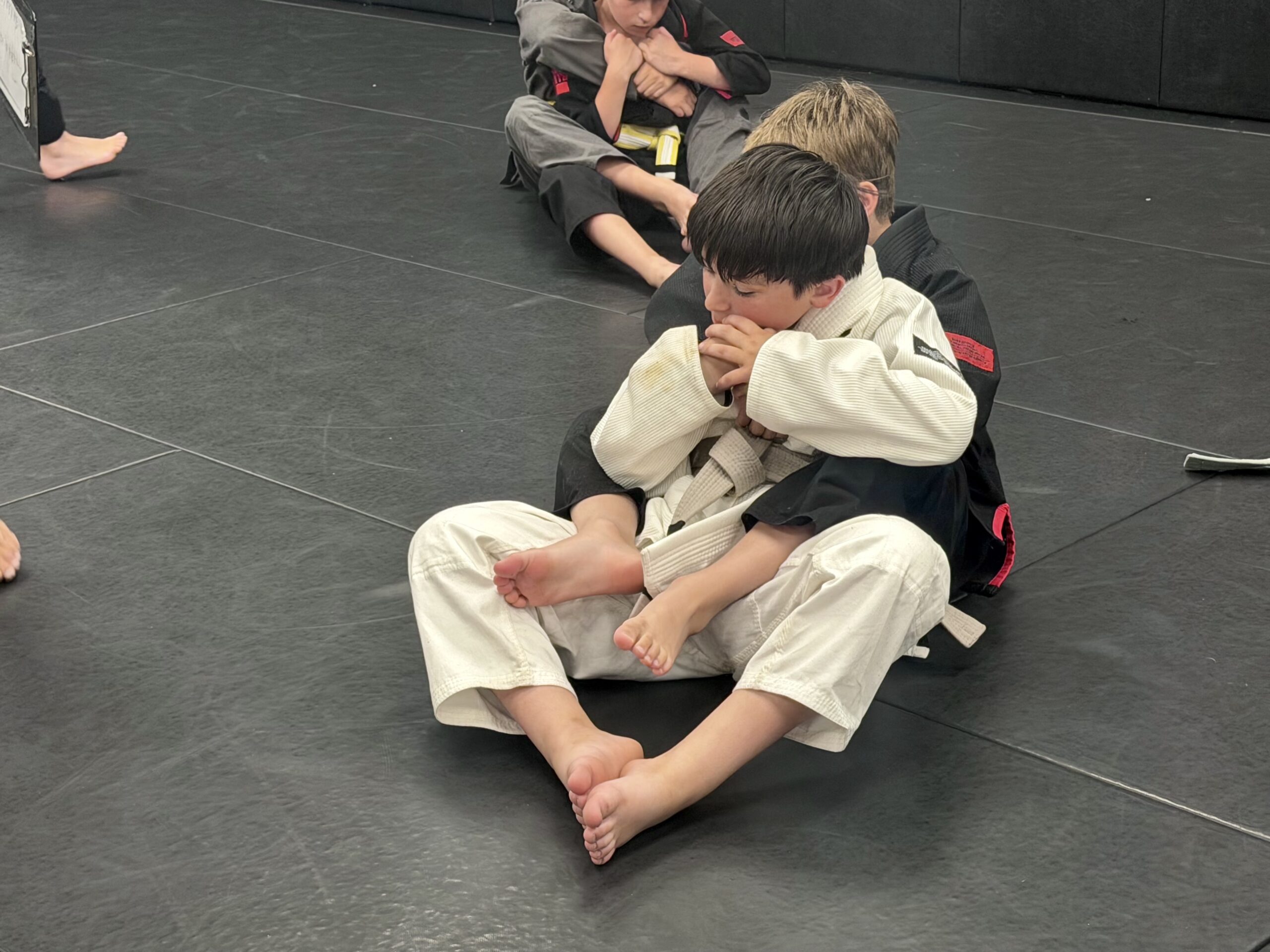 Kids Brazilian Jiu-Jitsu Training at Deep Water BJJ Children practicing Brazilian Jiu-Jitsu during a kids class at Deep Water BJJ in Harrisburg