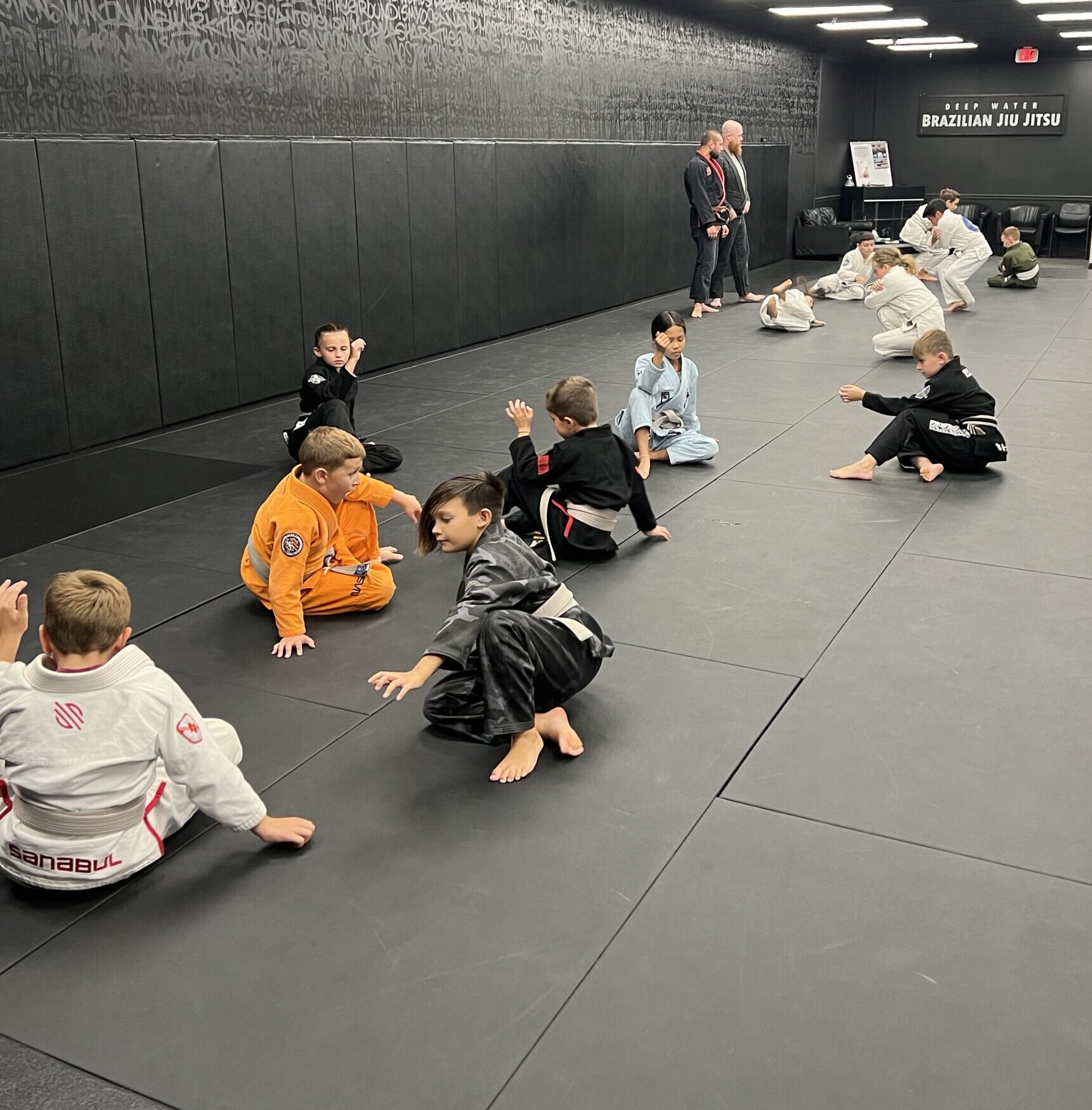 Kids Brazilian Jiu-Jitsu Class in Harrisburg Children practicing Brazilian Jiu-Jitsu during a Kids BJJ class at Deep Water BJJ in Harrisburg.