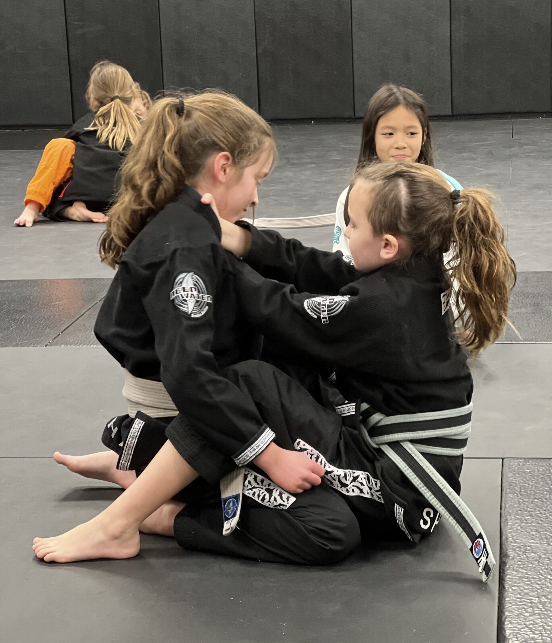 Kids Brazilian Jiu-Jitsu Training in Harrisburg Children practicing Brazilian Jiu-Jitsu during a Kids BJJ class at Deep Water BJJ in Harrisburg.